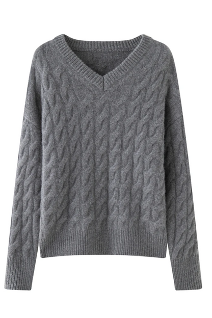 Gray cable knit sweater on a white background