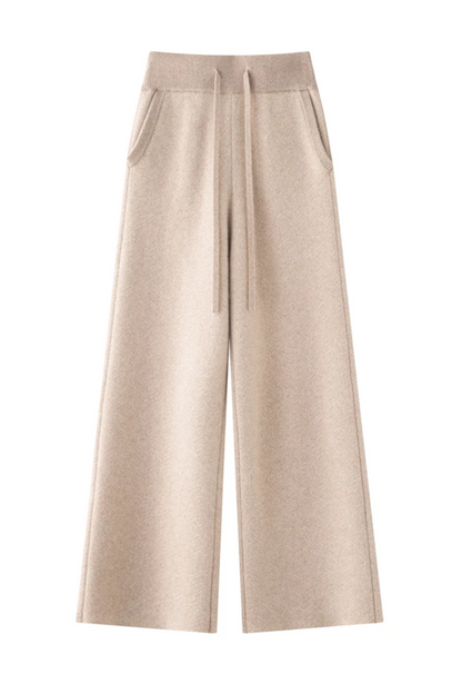 Camel wide-leg pants with a high collar on a white background