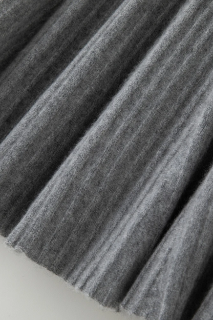Close-up of pleated fabric with a textured pattern